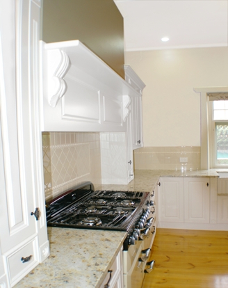 Adelaide Kitchens with typical French Provincial Style details, made by Compass Kitchens.